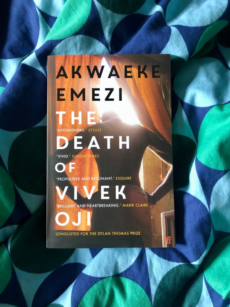 person with back to the viewer, hands on hips, sticking their head through a curtain allowing bright light to shine through